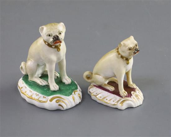 Two Rockingham porcelain figures of seated pugs, c.1830, H. 6.4cm and 5.5cm